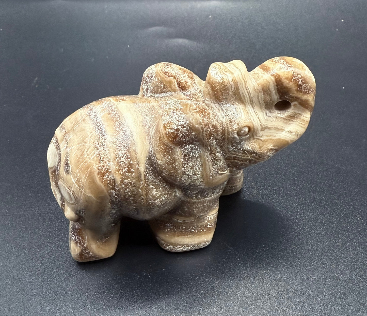 Chocolate Banded Calcite Elephant Carving