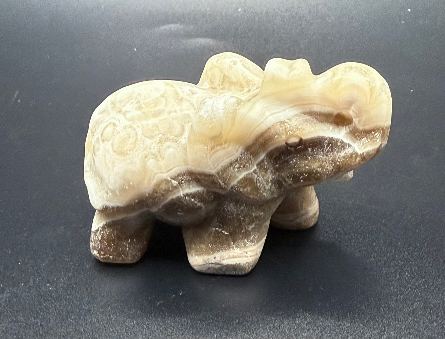 Chocolate Banded Calcite Elephant Carving