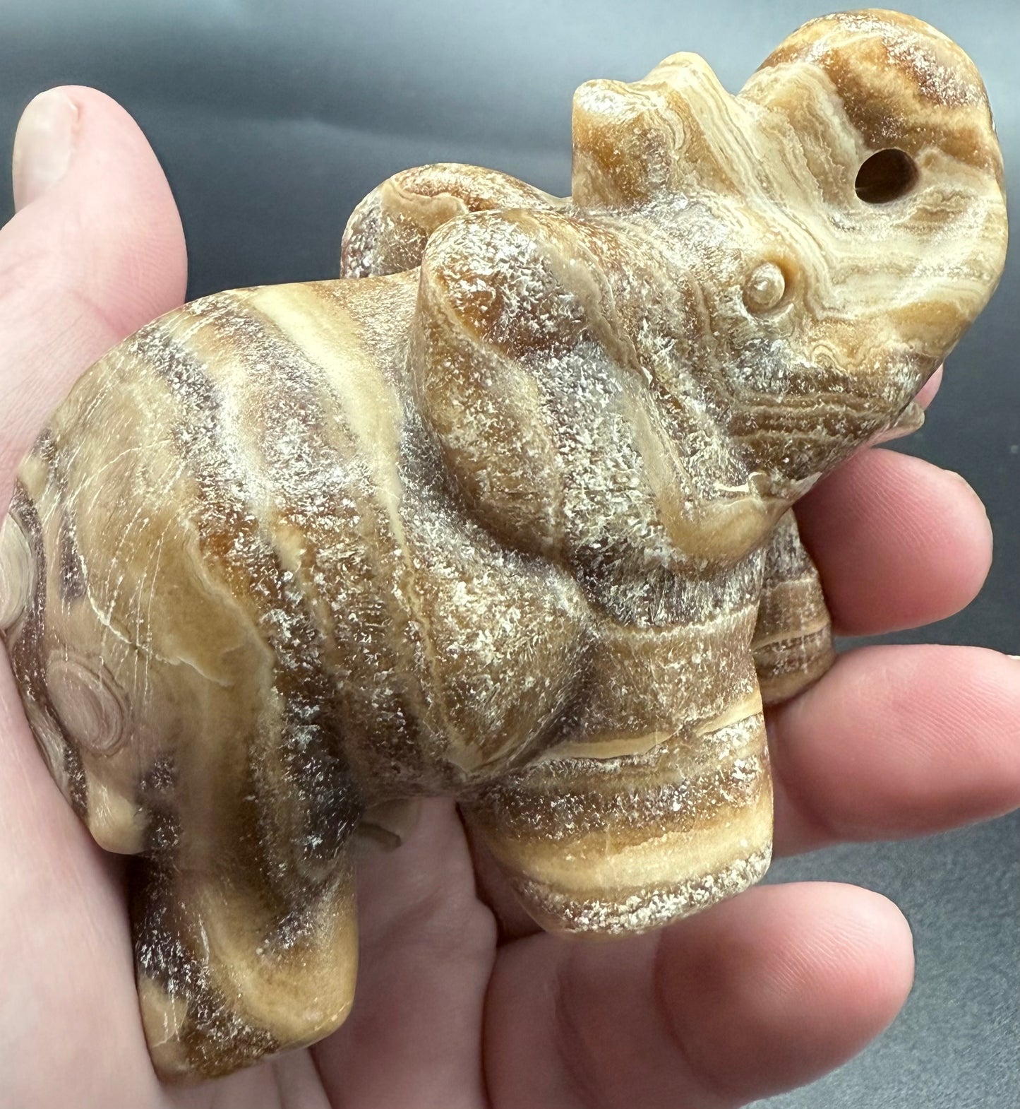 Chocolate Banded Calcite Elephant Carving