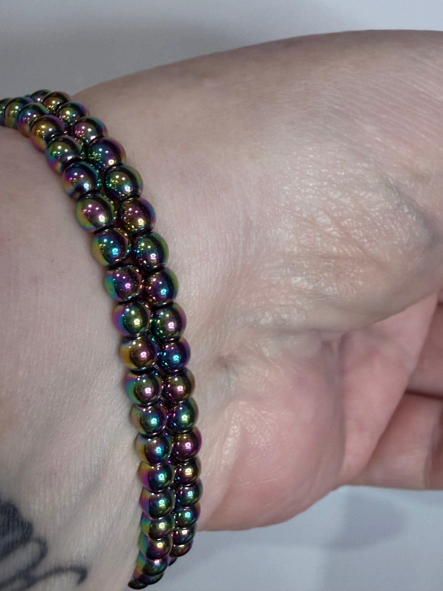 4 mm Aura Coated Hematite Bracelet –
Grounding • Balance • Protection
