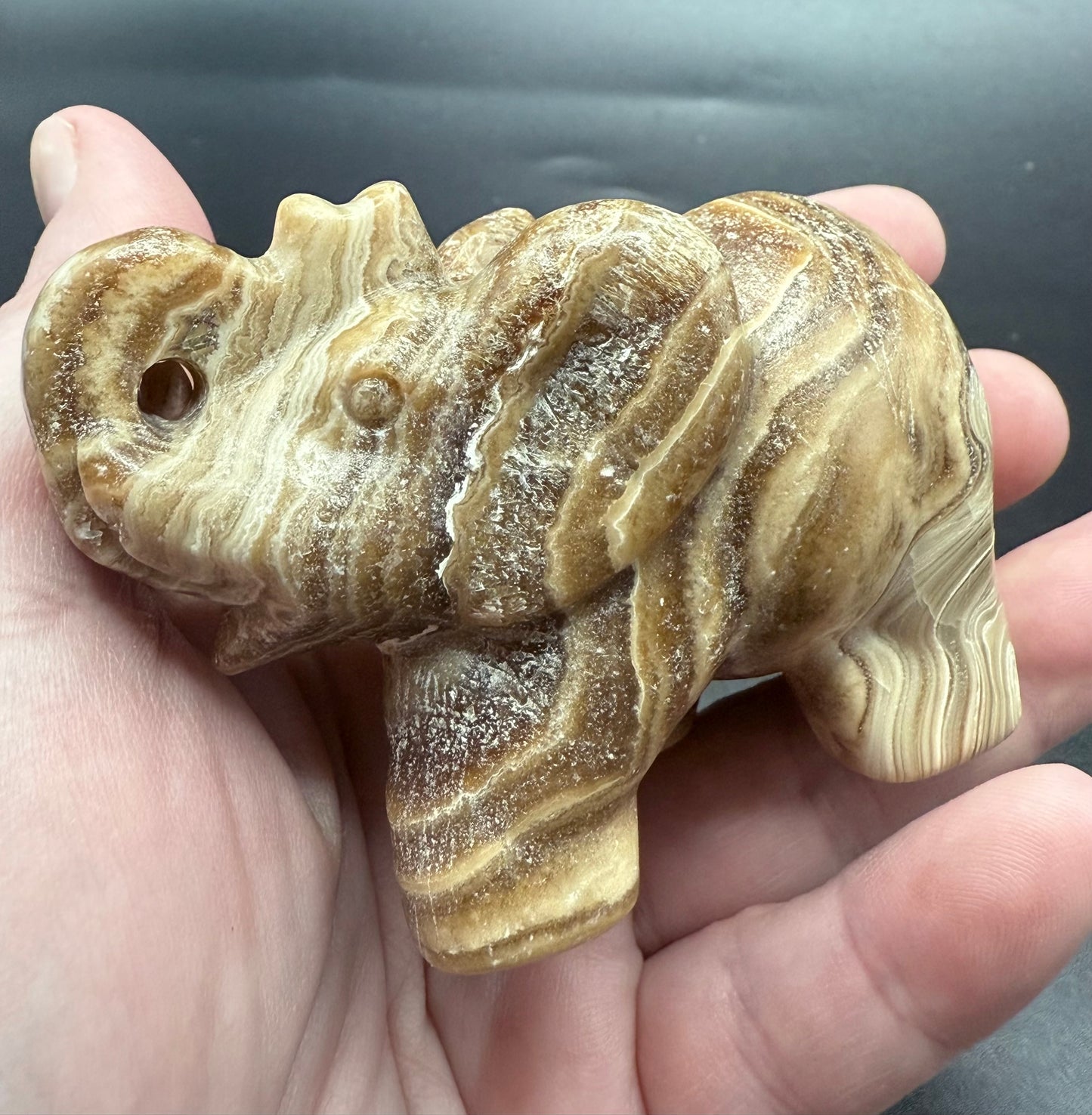 Chocolate Banded Calcite Elephant Carving