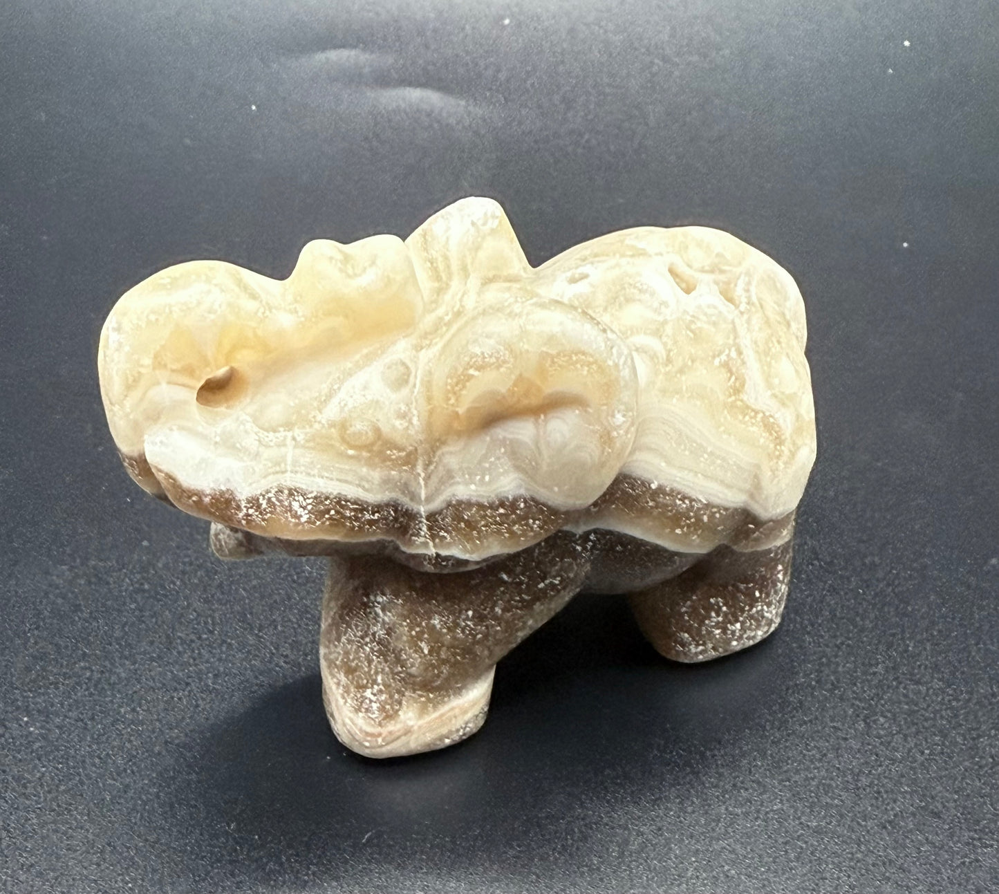 Chocolate Banded Calcite Elephant Carving