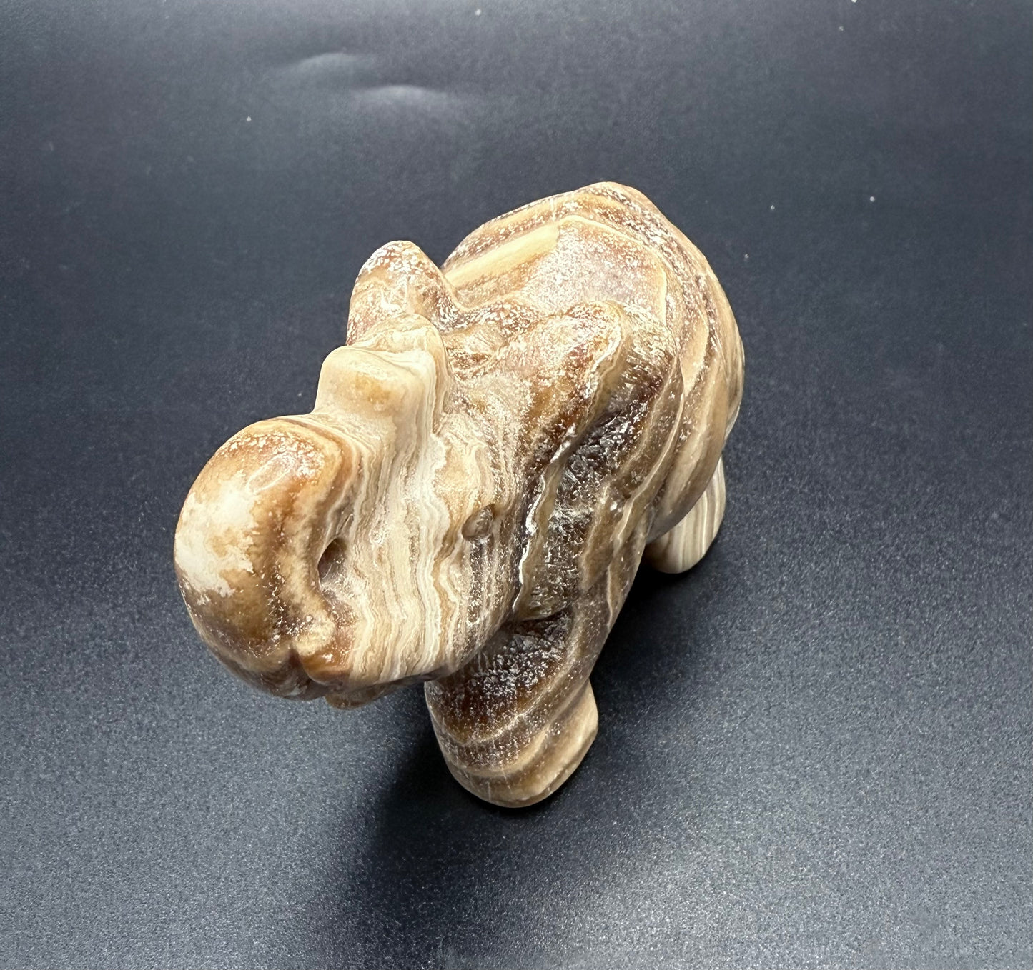 Chocolate Banded Calcite Elephant Carving