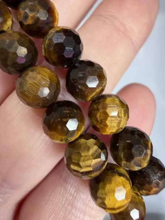 8mm Tiger’s Eye Faceted Bracelet

Confidence • Protection • Strength