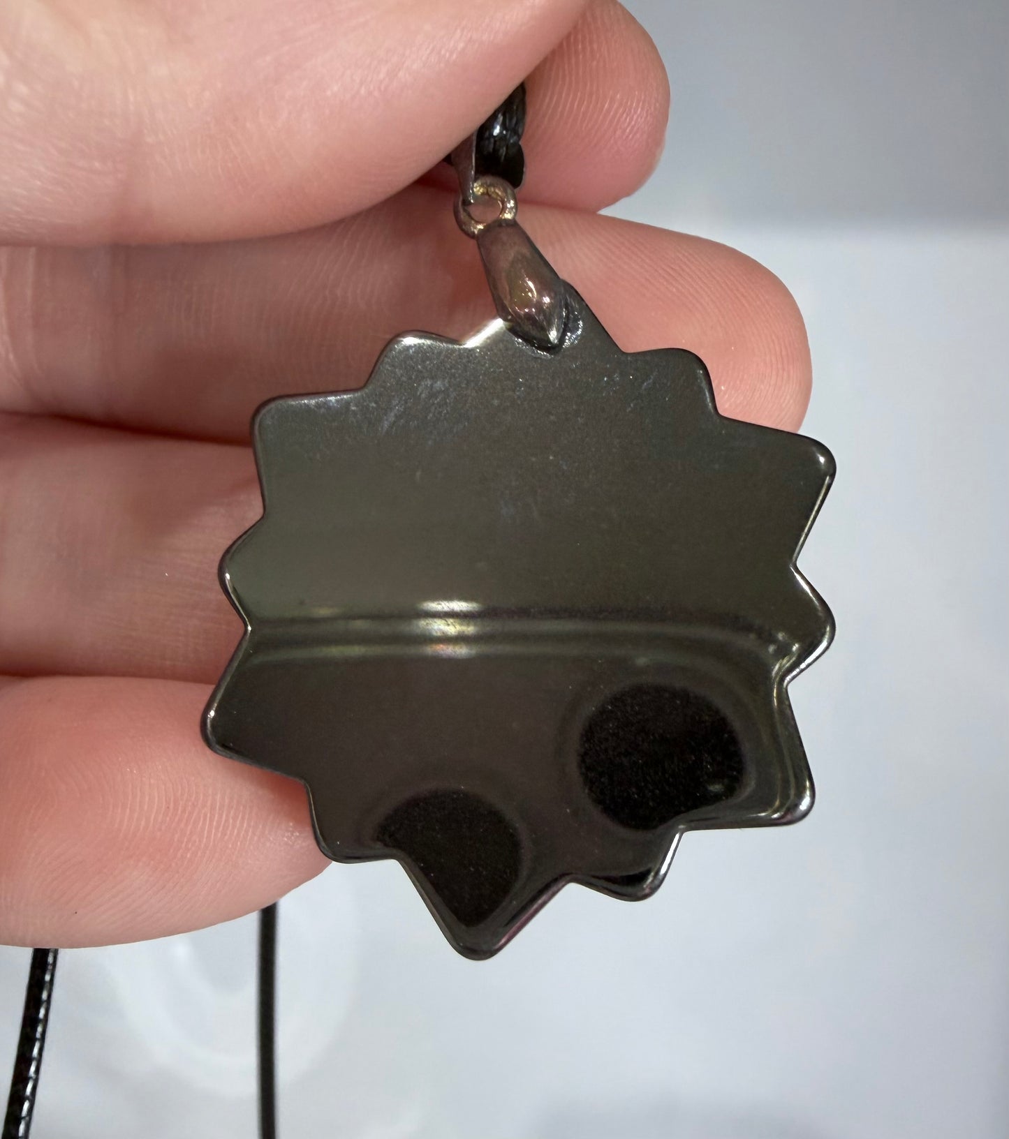 Hematite Sun Face Crystal Pendant – 3.6 × 3.4 cm