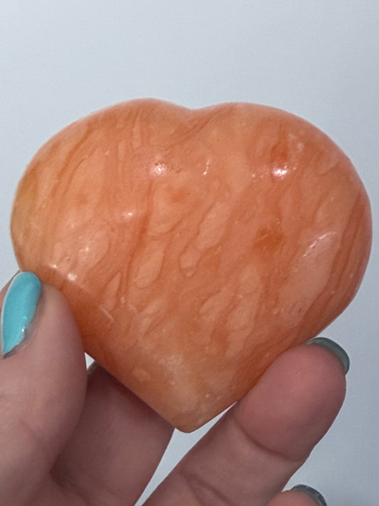 Orange Calcite Heart with Stand – 139g A 6.7cm