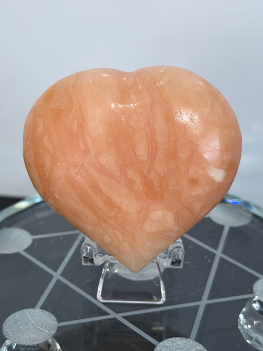 Orange Calcite Heart with Stand – 112g D 6.1cm