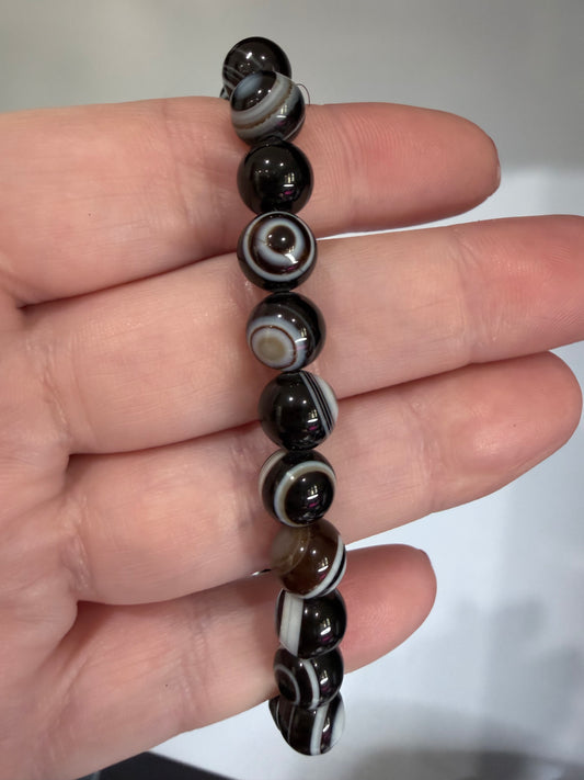 8mm Thousand Eye Dzi Agate Bracelet

Protection • Awareness • Grounding