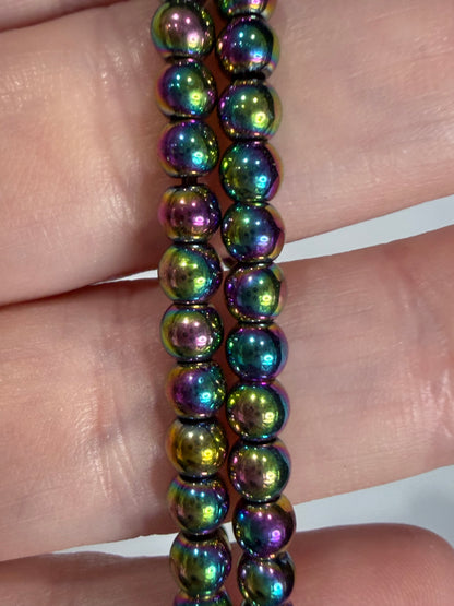 4 mm Aura Coated Hematite Bracelet –

Grounding • Balance • Protection