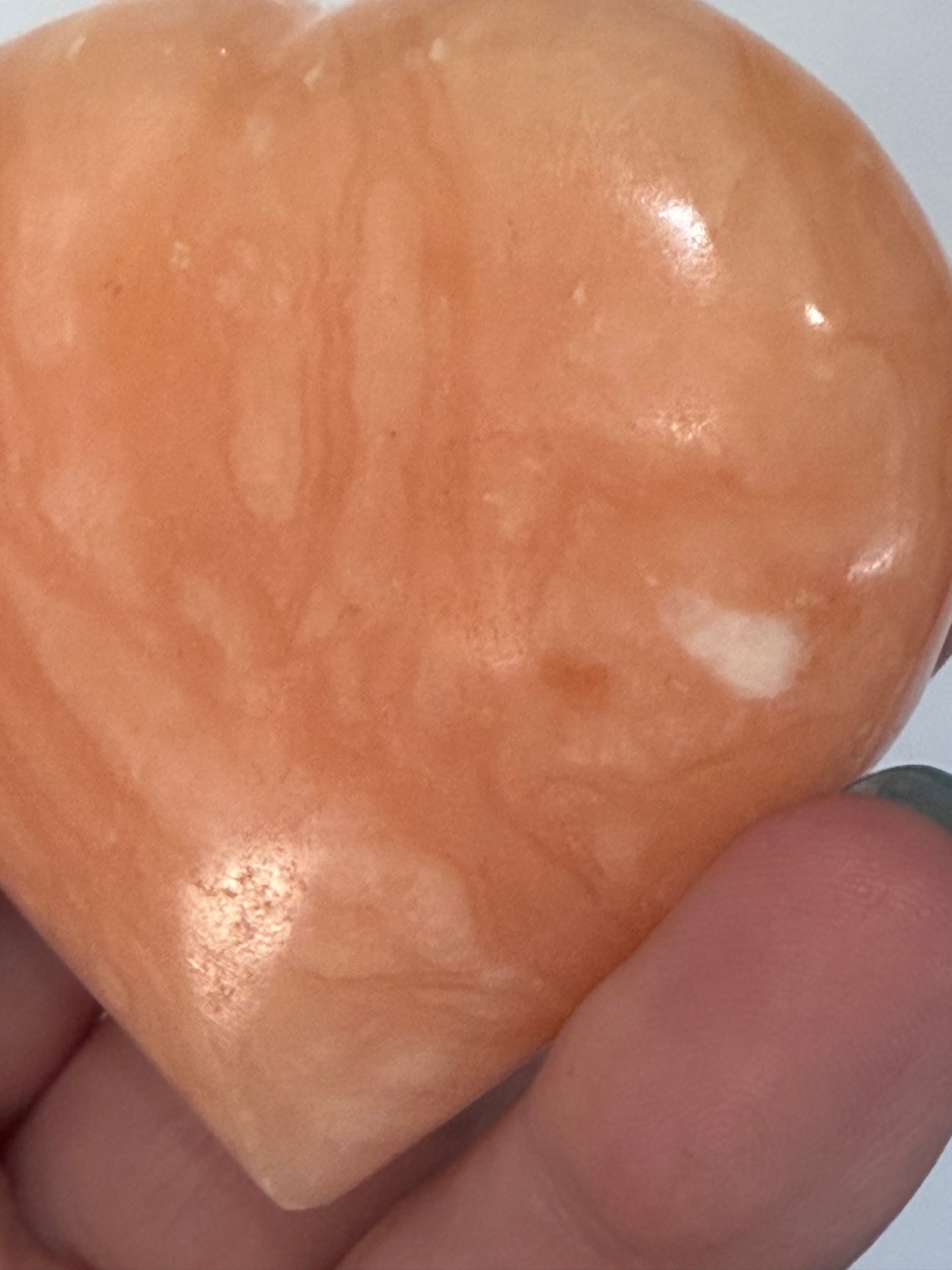 Orange Calcite Heart with Stand – 112g D 6.1cm
