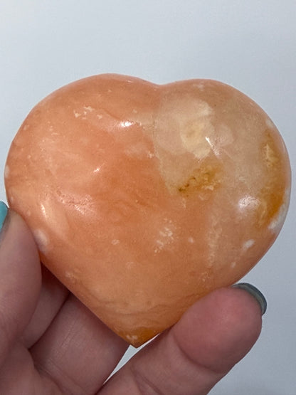 Orange Calcite Heart with Stand – 133g E 6.7cm