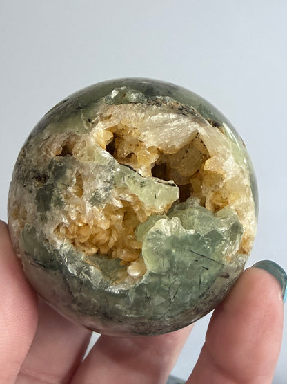 Prehnite with Epidote & Calcite Crystal Cave Sphere C - 5.7cm