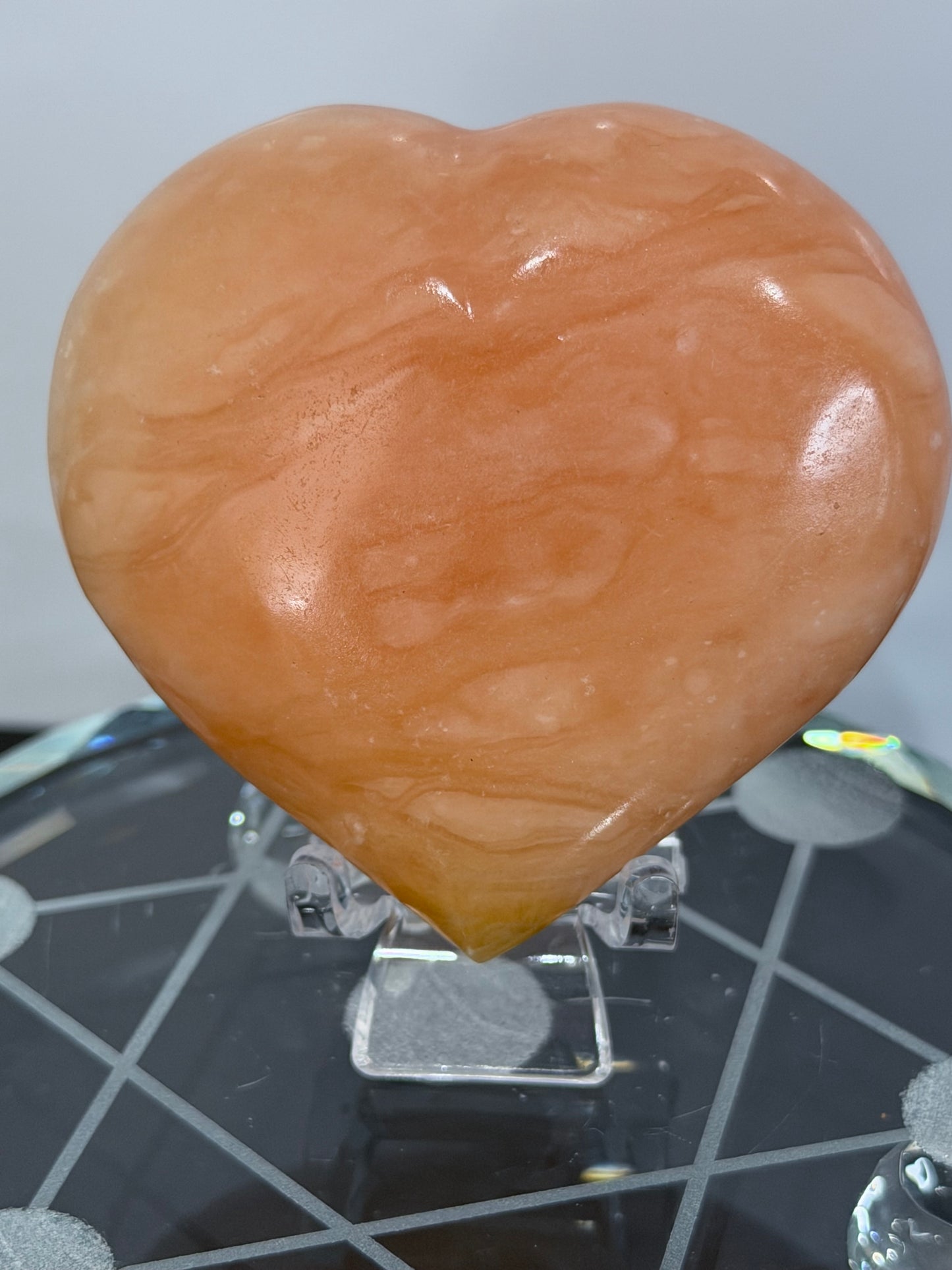 Orange Calcite Heart with Stand – 133g E 6.7cm