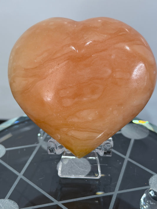 Orange Calcite Heart with Stand – 133g E 6.7cm