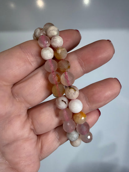 8mm Flower Agate Faceted Bracelet

Growth • New Beginnings • Emotional Healing