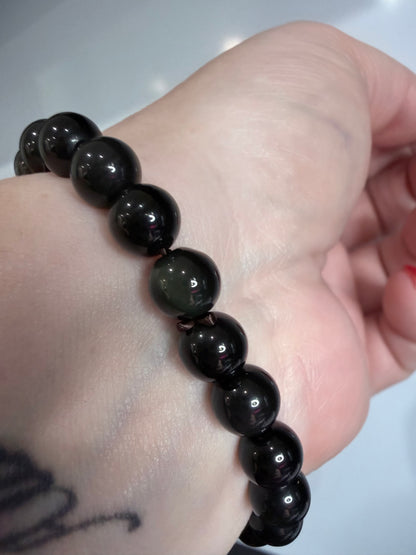 8mm Rainbow Sheen Obsidian Bracelet

Protection • Truth • Inner Strength