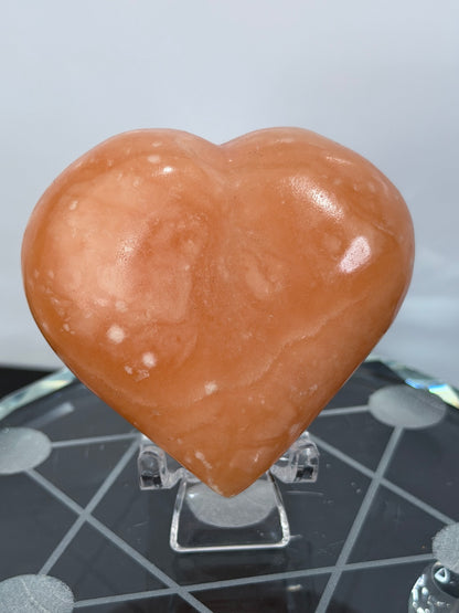 Orange Calcite Heart with Stand – 132g B 6.1cm