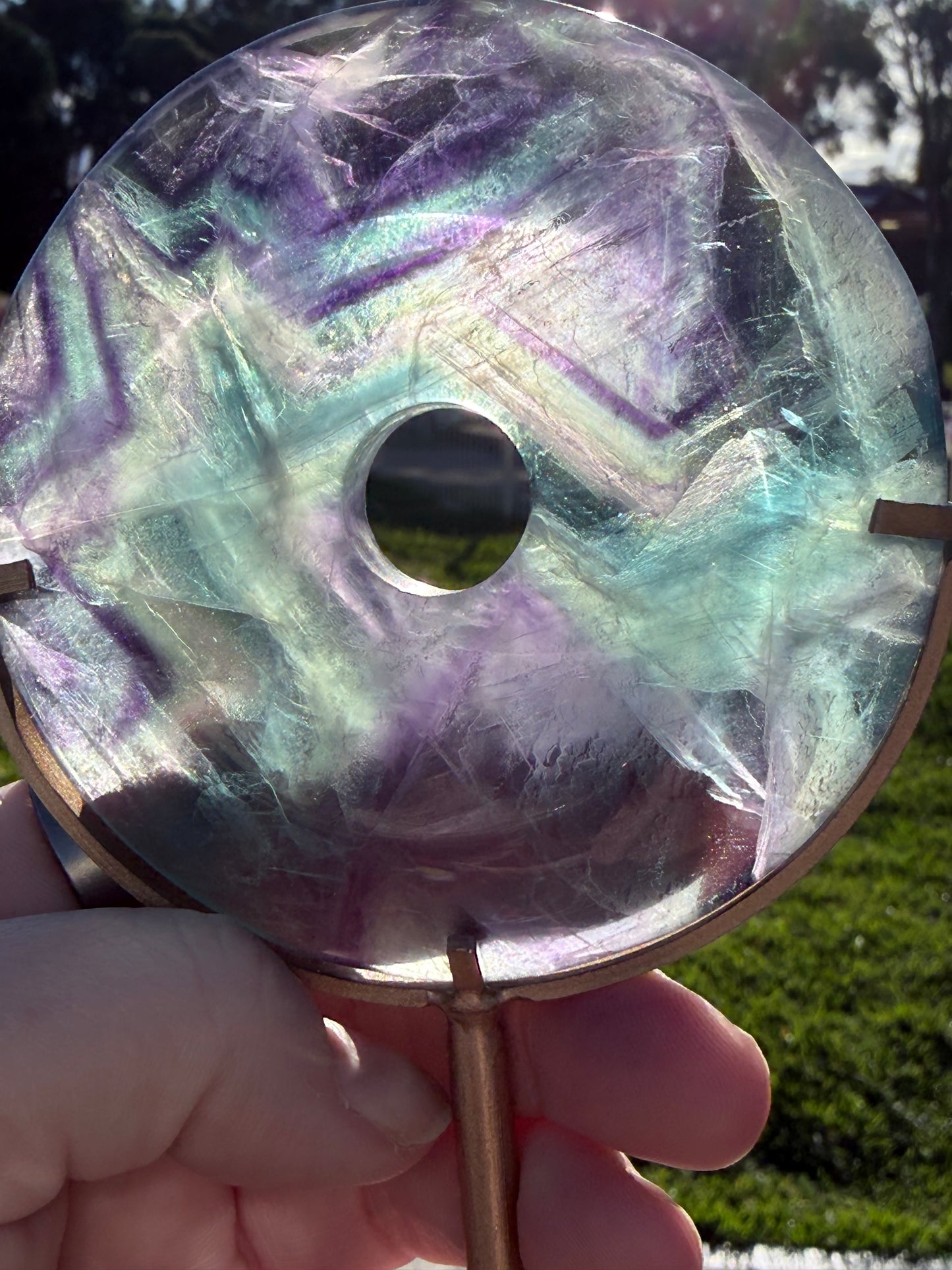 Rainbow Fluorite Donut on Stand – 9cm 250g 17cm On Stand