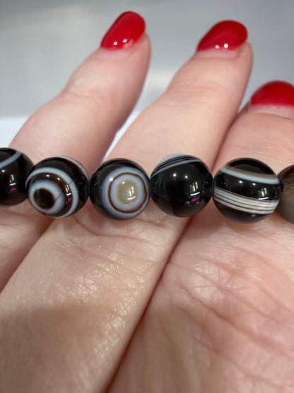 8mm Thousand Eye Dzi Agate Bracelet

Protection • Awareness • Grounding