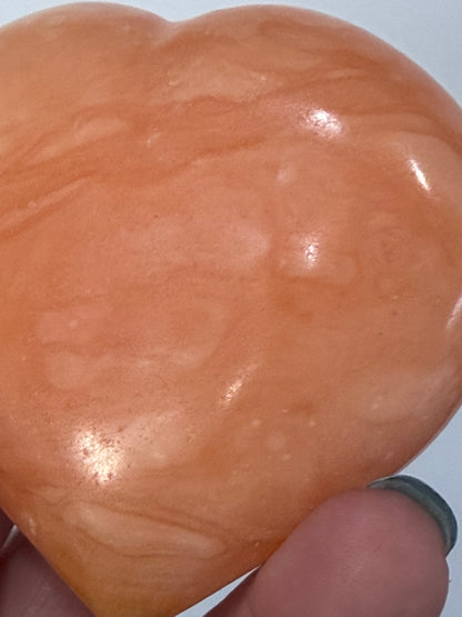 Orange Calcite Heart with Stand – 133g E 6.7cm