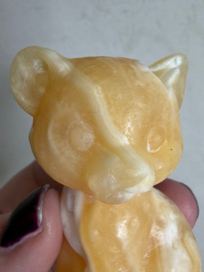 Orange Calcite Leopard Cub Carving – 6.2cm