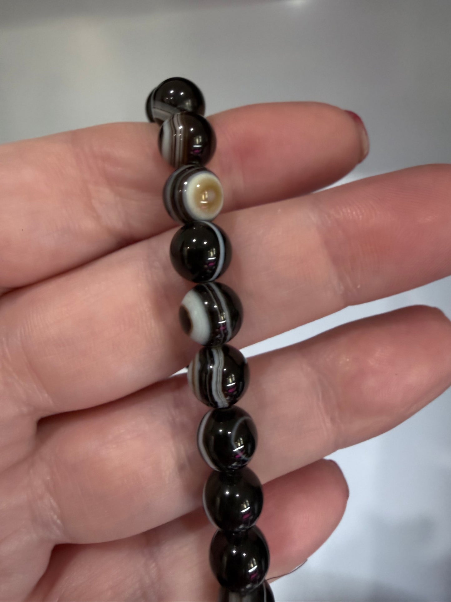 8mm Thousand Eye Dzi Agate Bracelet

Protection • Awareness • Grounding
