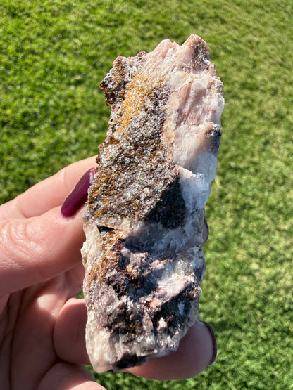 Manganese with Quartz Cluster