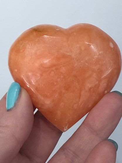 Orange Calcite Heart with Stand – 132g B 6.1cm