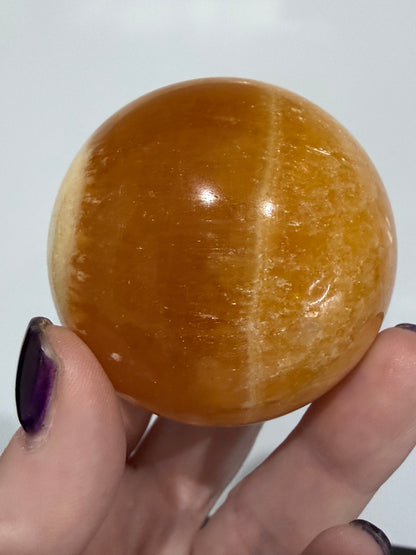 🍊 Orange Calcite Sphere – 5.6 cm | 260 g