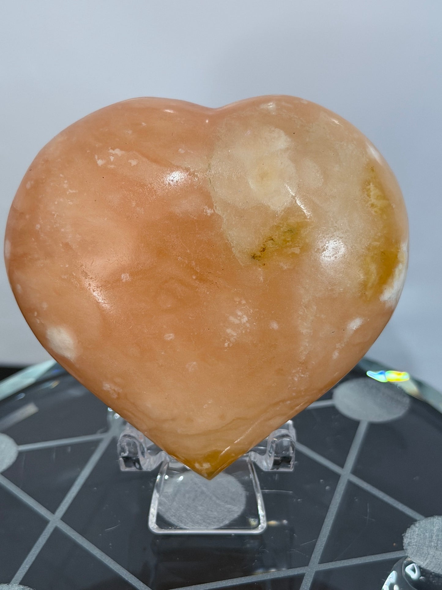 Orange Calcite Heart with Stand – 133g E 6.7cm