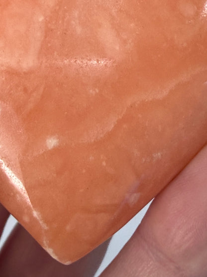 Orange Calcite Heart with Stand – 132g B 6.1cm