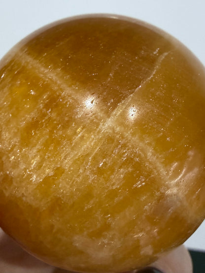 🍊 Orange Calcite Sphere – 5.6 cm | 260 g