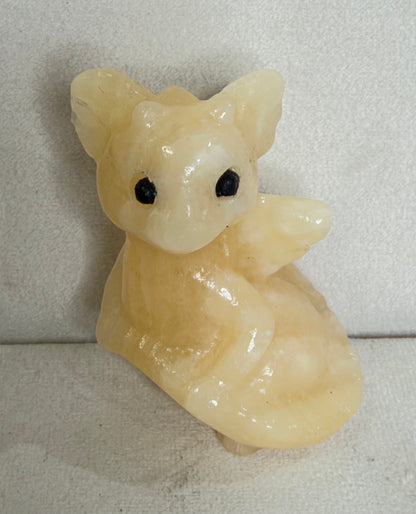 Baby Dragon Yellow Calcite Carving – 6 cm
