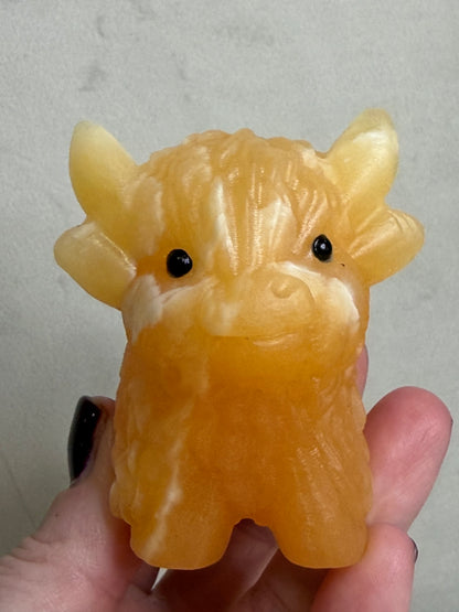 Highland Cow Orange Calcite Carving – 8 cm