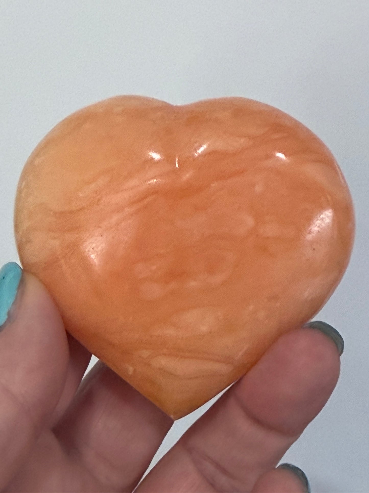 Orange Calcite Heart with Stand – 133g E 6.7cm