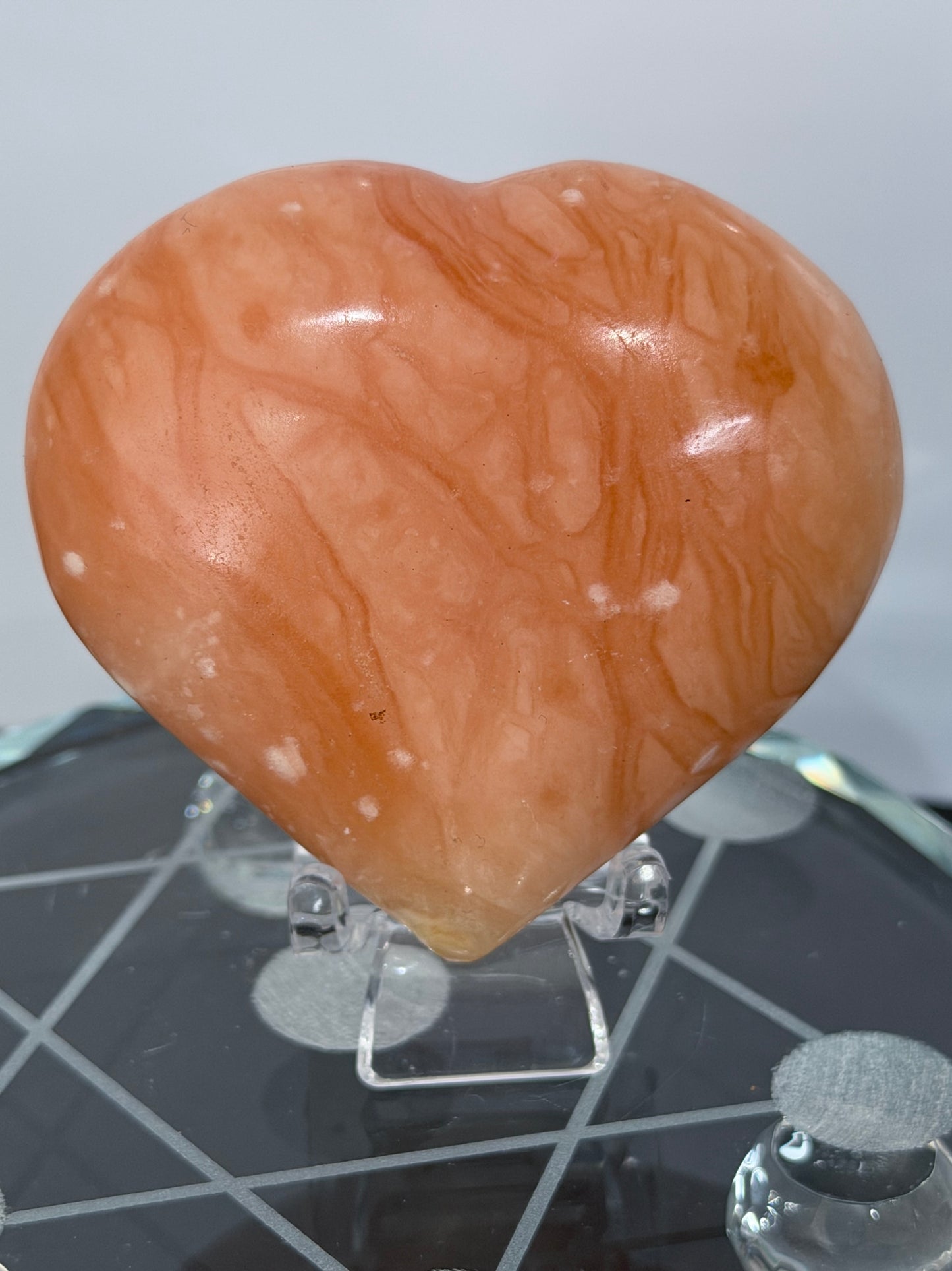 Orange Calcite Heart with Stand – 139g A 6.7cm