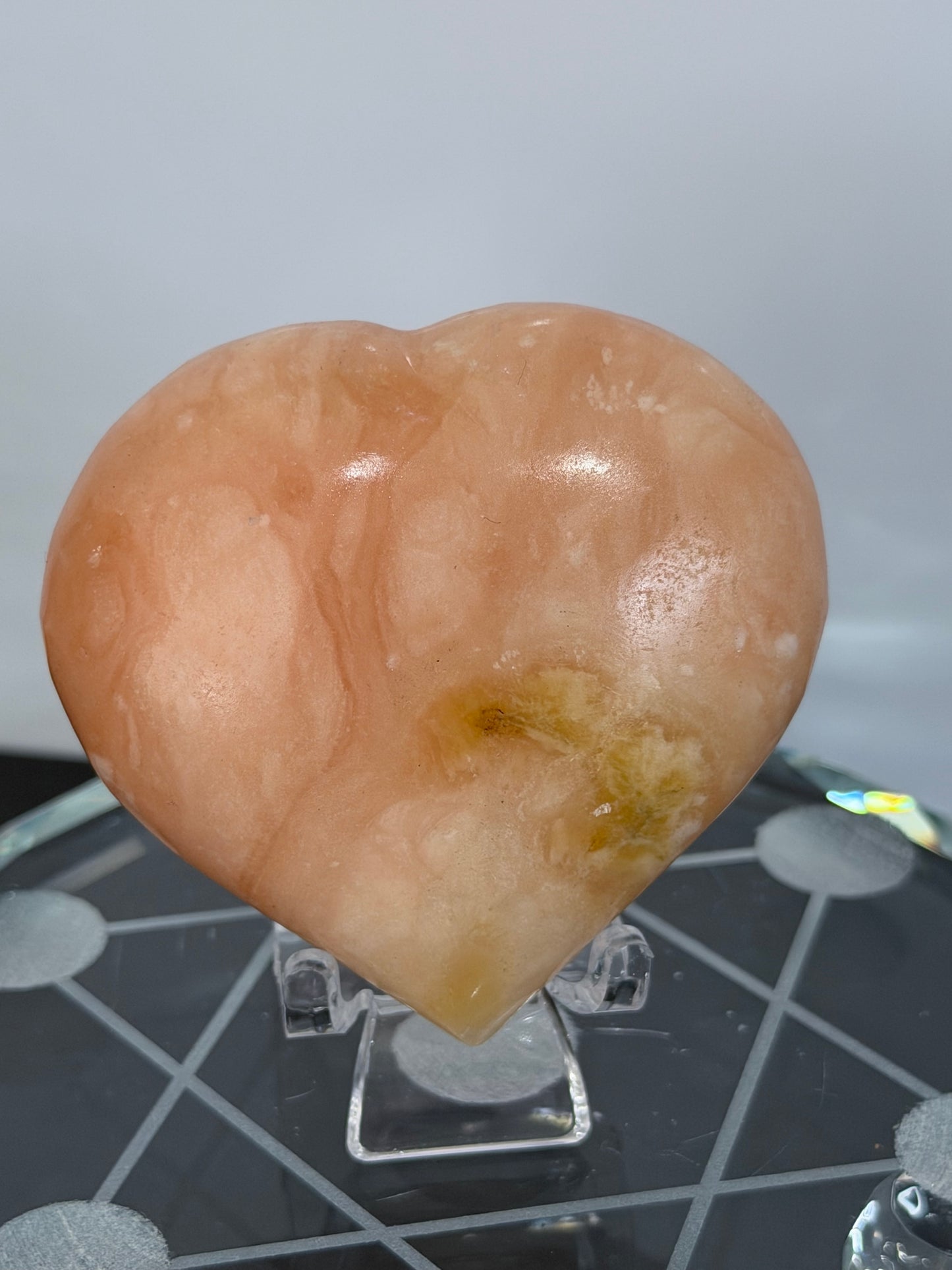 Orange Calcite Heart with Stand – 112g D 6.1cm