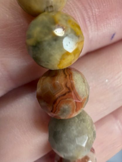 8mm Crazy Lace Agate Faceted Bracelet

Joy • Balance • Positive Energy