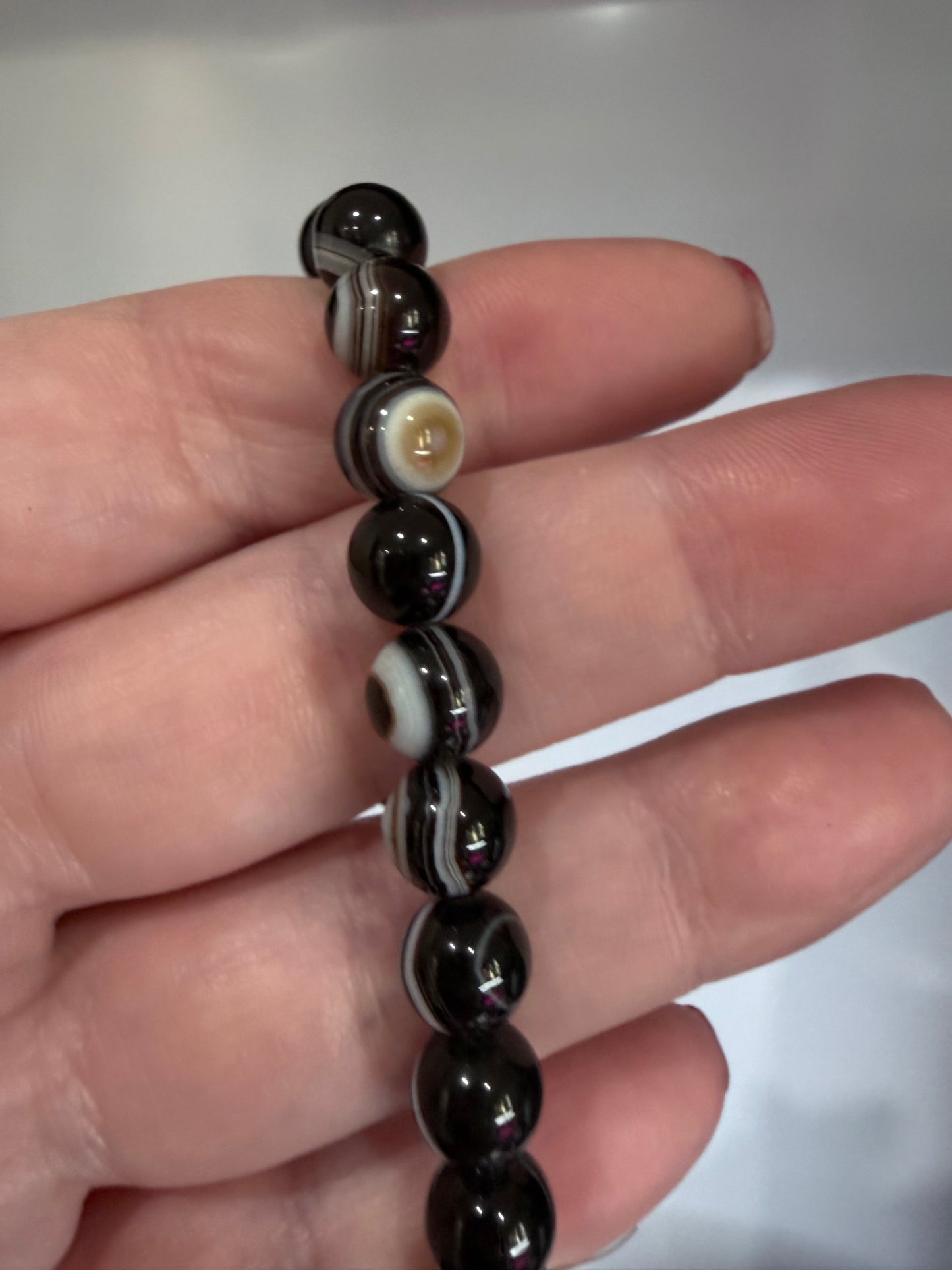 8mm Thousand Eye Dzi Agate Bracelet

Protection • Awareness • Grounding