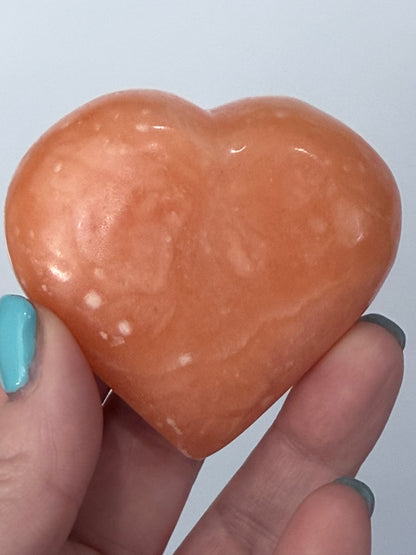 Orange Calcite Heart with Stand – 132g B 6.1cm