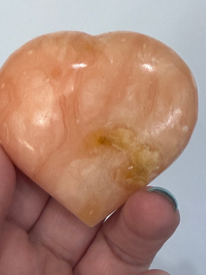 Orange Calcite Heart with Stand – 112g D 6.1cm